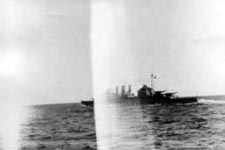 County class cruiser in war channel, July 1942